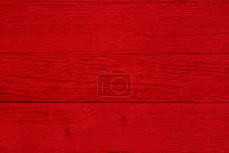 Foto de Fondo de madera granulada de color rojo oscuro con textura de grano con espacio de copia para su mensaje o uso como textura - Imagen libre de derechos