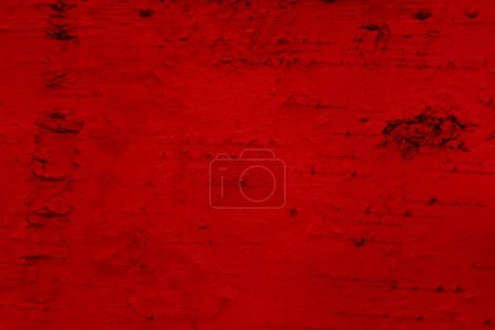 Foto de Fondo de madera granulada de color rojo oscuro con textura de grano con espacio de copia para su mensaje o uso como textura - Imagen libre de derechos