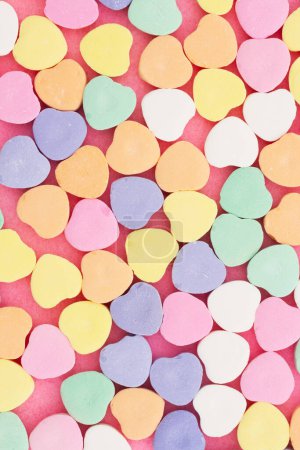 Photo for Lots of candy hearts love background for your romance or dating message - Royalty Free Image
