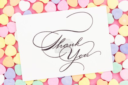 Foto de Thank You greeting card with lots of candy hearts for saying thanks to your customers - Imagen libre de derechos
