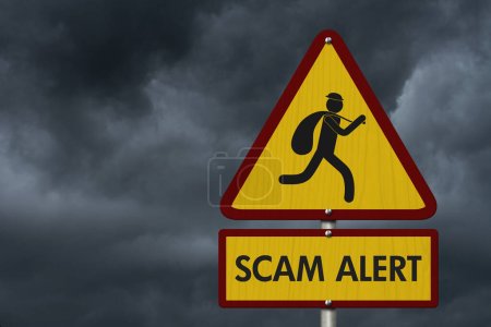 Photo for Scam Alert message on yellow warning road sign on stormy sky - Royalty Free Image