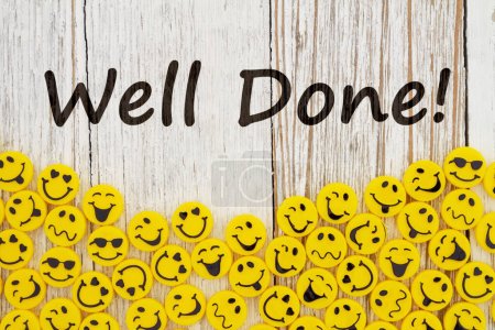 Well Done message with yellow happy buttons border on weathered wood for your great message