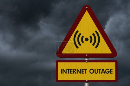 Photo for Internet Outage message on yellow warning road sign with stormy sky - Royalty Free Image