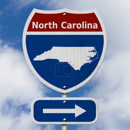 Photo for Road trip to North Carolina, Red, white and blue interstate highway road sign with word North Carolina and map of North Carolina with sky background - Royalty Free Image
