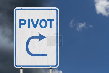 Photo for Pivot this way message on highway road sign isolated with stormy and sunny sky - Royalty Free Image