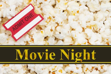Photo for Movie night message or invitation with popcorn and admission ticket - Royalty Free Image