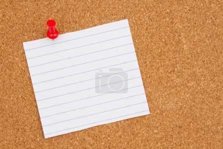 Photo for Brown corkboard with torn paper and pushpin background - Royalty Free Image