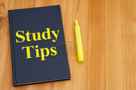 Photo for Study Tips with retro old blue book with highlighter marker on a desk for reading or school - Royalty Free Image