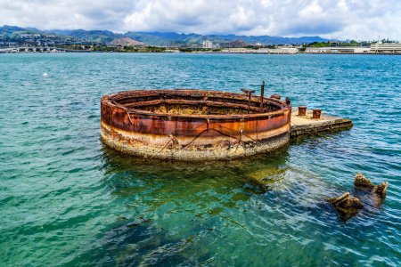 Photo for Submerged Gun Turret USS Arizona Memorial Dock Pearl Harbor Honolulu Oahu Hawaii Memorial is over Arizona battleship sunk at time of Pearl Harbor attack December 7, 1941 killing thousands still in the ship - Royalty Free Image