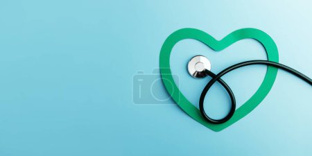 Téléchargez les photos : Health Care Awareness Concept. Journée mondiale du cœur. Papier coupé en forme de coeur avec stéthoscope en vue du dessus. Vie, amour et soins du cœur et cardiovasculaire - en image libre de droit