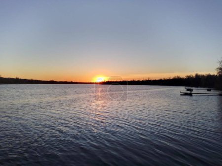 Photo for Spring sunset over the wide banks of the Dnieper River. Ukraine - Royalty Free Image