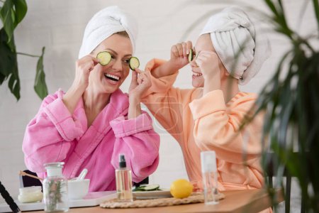 Photo for Beautiful mother and daughter making skin treatment - Royalty Free Image