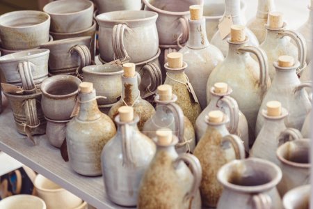 Photo for Pottery, pots and jars in clay shop - Royalty Free Image