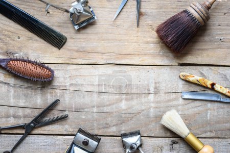 set of barber tools on wooden background 