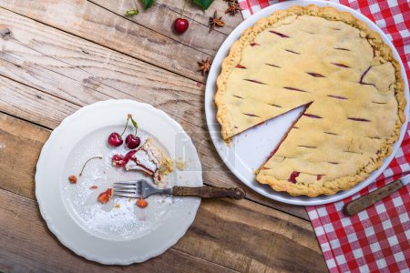 Photo for Homemade cherry pie on wooden background - Royalty Free Image