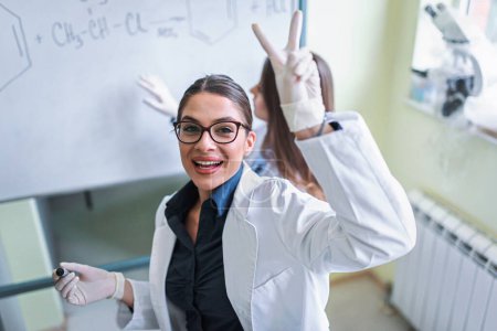 Photo for Young female scientists working in laboratory - Royalty Free Image