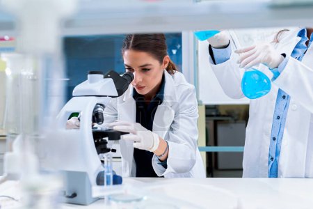 Photo for Young female scientists working in laboratory - Royalty Free Image
