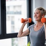senior woman exercising with dumbbells