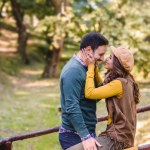 young couple in love posing outdoors