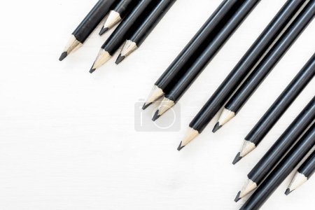 Photo for Black pencils on white background - Royalty Free Image