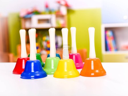 Photo for Colorful music toys bells on  background - Royalty Free Image