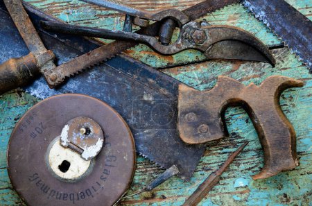 Photo for Old Rusty Vivid Tools on Work Bench - Royalty Free Image