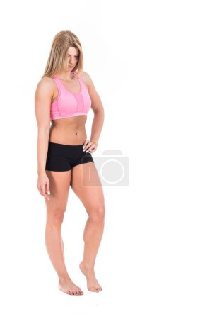 Photo for Young beautiful woman in sportswear isolated on white background - Royalty Free Image