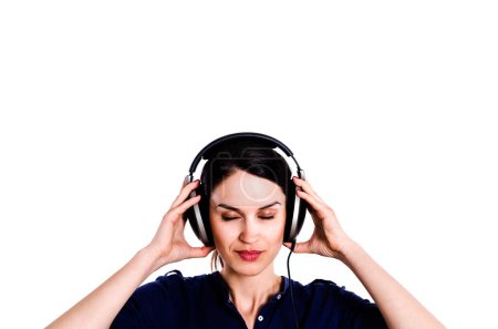 Foto de Ojos cerrados chica con auriculares escuchar música - Imagen libre de derechos