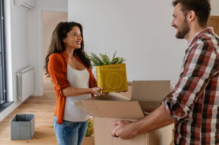 Photo for Young couple with boxes moving day concept - Royalty Free Image