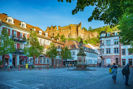 Photo for HEIDELBERG, BADEN-WUERTTEMBERG, GERMANY - CIRCA MAY, 2023: The Kornmarkt of Heidelberg town, Germany. - Royalty Free Image