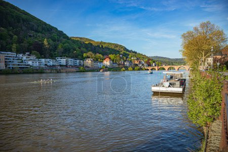 Photo for HEIDELBERG, BADEN-WUERTTEMBERG, GERMANY - CIRCA MAY, 2023: The riverside of Heidelberg town, Germany. - Royalty Free Image