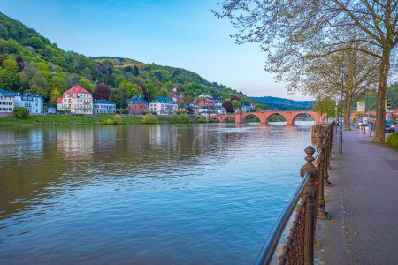 Photo for HEIDELBERG, BADEN-WUERTTEMBERG, GERMANY - CIRCA MAY, 2023: The riverside of Heidelberg town, Germany. - Royalty Free Image