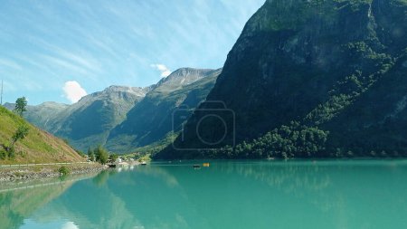 Norwegian landscape with bluish green lake Oldevatnet in Oldedalen valley. 