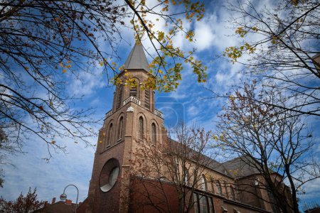 Photo for Saint Mary church of Nippes, also called  katholische kirche sankt marien, at fall. It's the catholic church of Nippes, one of the districts of Cologne, Germany. - Royalty Free Image