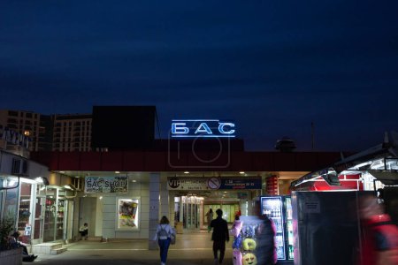 Photo for BELGRADE, SERBIA - OCTOBER 8, 2022: Selective blur Logo of BAS, or Beogradska Autobuska Stanica, the Belgrade Bus Station, at the entrance to the main coach terminal of the capital city of Serbia at night - Royalty Free Image