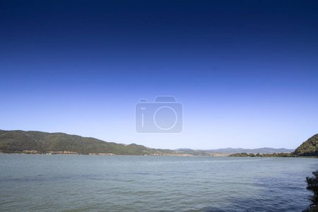 Photo for Panorama of the Danube river near the Serbian city of Donji Milanovac in Iron Gates, also known as Djerdap, which are the Danube gorges, a natural symbol of the border between Serbia and Romania. - Royalty Free Image