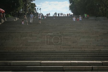Photo for ODESSA, UKRAINE - AUGUST 6, 2014: Selective blur on people descending Potemkin stairs. The Odessa stairs, that got pictured in the famous Soviet movie Potemkin, are a major landmark of this Ukrainian city. - Royalty Free Image