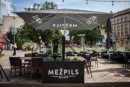 Photo for RIGA, LATVIA - AUGUST 25, 2023: Mezpils Alus logo a bar retailer in Riga. Mezpils is a latvian beer produced by the group baltic Beverages Holding part of Carlsberg Group. - Royalty Free Image