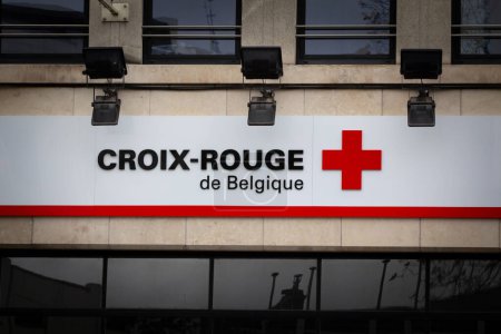 Photo for LIEGE, BELGIUM - NOVEMBER 9, 2022: Logo of Red Cross of belgium (Croix rouge de Belgique) with its distinctive logo on their Liege office. It is a humanitarian organisation that provides aid. - Royalty Free Image