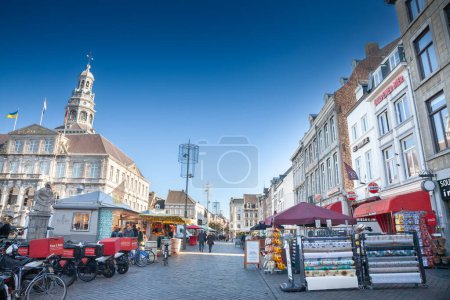 Photo for MAASTRICHT, NETHERLANDS - NOVEMBER 10, 2022: Panorama of Market Maastricht with the local farmers market in in Maastricht city center, a pedestrian street and square surrounded by shops, stores. - Royalty Free Image