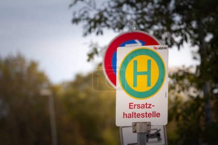 Photo for AACHEN, GERMANY - NOVEMBER 8, 2022: typical austrian & german bus stop sign, called haltestelle, bushaltestelle, in Aachen urban environment indicating presence of a public transportation stop station. - Royalty Free Image
