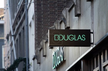 Photo for MAASTRICHT, NETHERLANDS - NOVEMBER 10, 2022: Douglas Cosmetics Logo on their main shop in Maastricht. Douglas is a German perfume and cosmetics retailer spread accross Central Europe. - Royalty Free Image