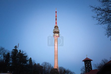 Photo for Selective blur on Avala tower, or Avala toranj, seen from below at night. It is a TV tower and broadcasting antenna in the suburbs of Belgrade, Serbia. - Royalty Free Image