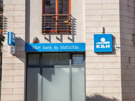 Photo for PECS, HUNGARY - SEPTEMBER 26, 2023: K&H Bank logo on their main office for Pecs. Also known as Kereskedelmi es Hitelbank, it's one of the main banks of Hungary, belonging to KBC Bank of Belgium. - Royalty Free Image