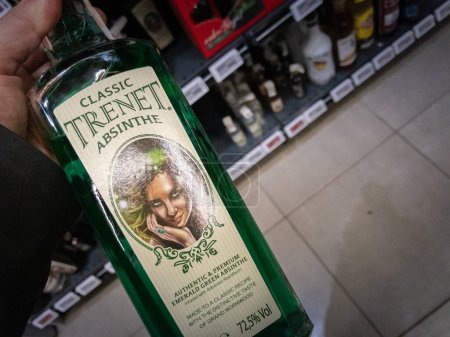 Photo for BELGRADE, SERBIA - FEBRUARY 2, 2024: Selective blur on a Trenet Absinthe bottle for sale in a supermarket of Belgrade. Trenet is a czech brand producing traditional absinthe, of 72.5% potent alcohol. - Royalty Free Image