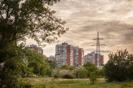 High rise buildings from district of Blok 70 in Novi Beograd, in Belgrade, Serbia with power lines.communist housing ensemble with a brutalist style typical from Central & Eastern Europe.