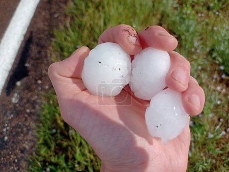 Large hail collected during a supercell thunderstorm near the town of Idalia, Colorado on August 7th, 2023.