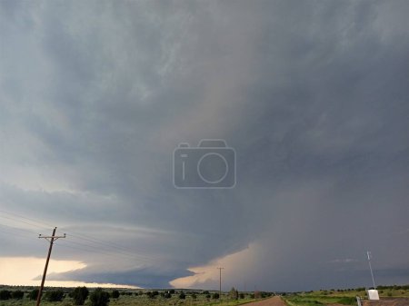 A tornado-producing mesocyclone marching slowly towards to town of Kim, Colorado.