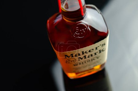 Photo for LONDON, UNITED KINGDOM - JULY 24, 2022 The original Maker's Mark in a characteristic squarish bottle sealed with red wax, famous American whisky - Royalty Free Image