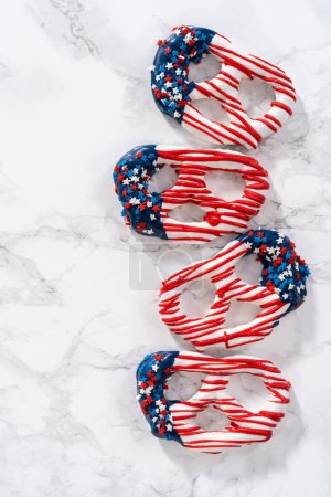 American flag. Red, white, and blue chocolate-covered pretzel twists.